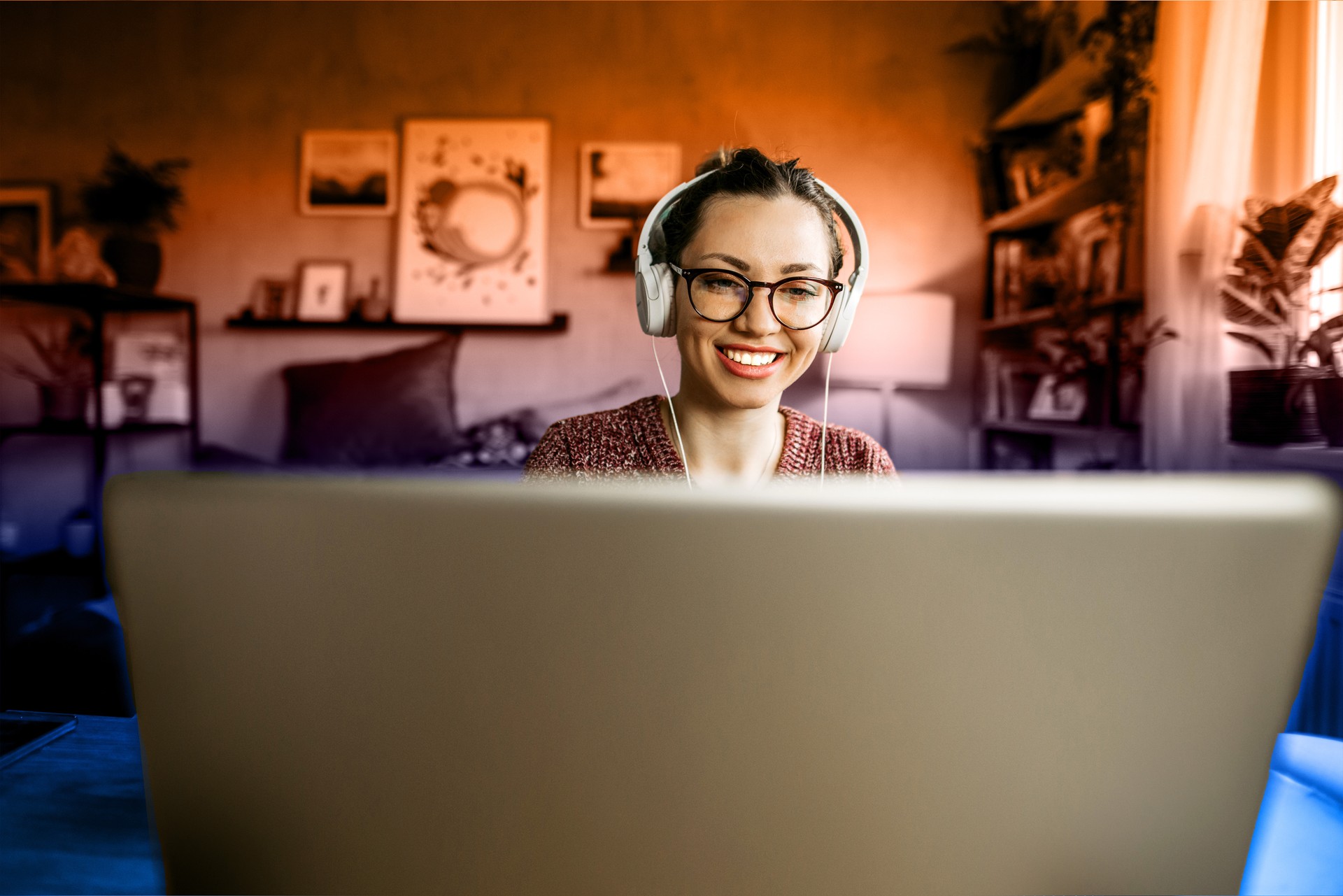 lady watching webinar on laptop