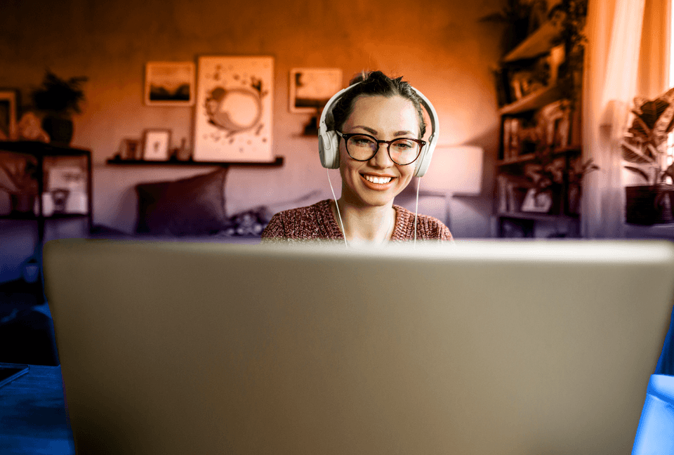 woman watching webinar on laptop