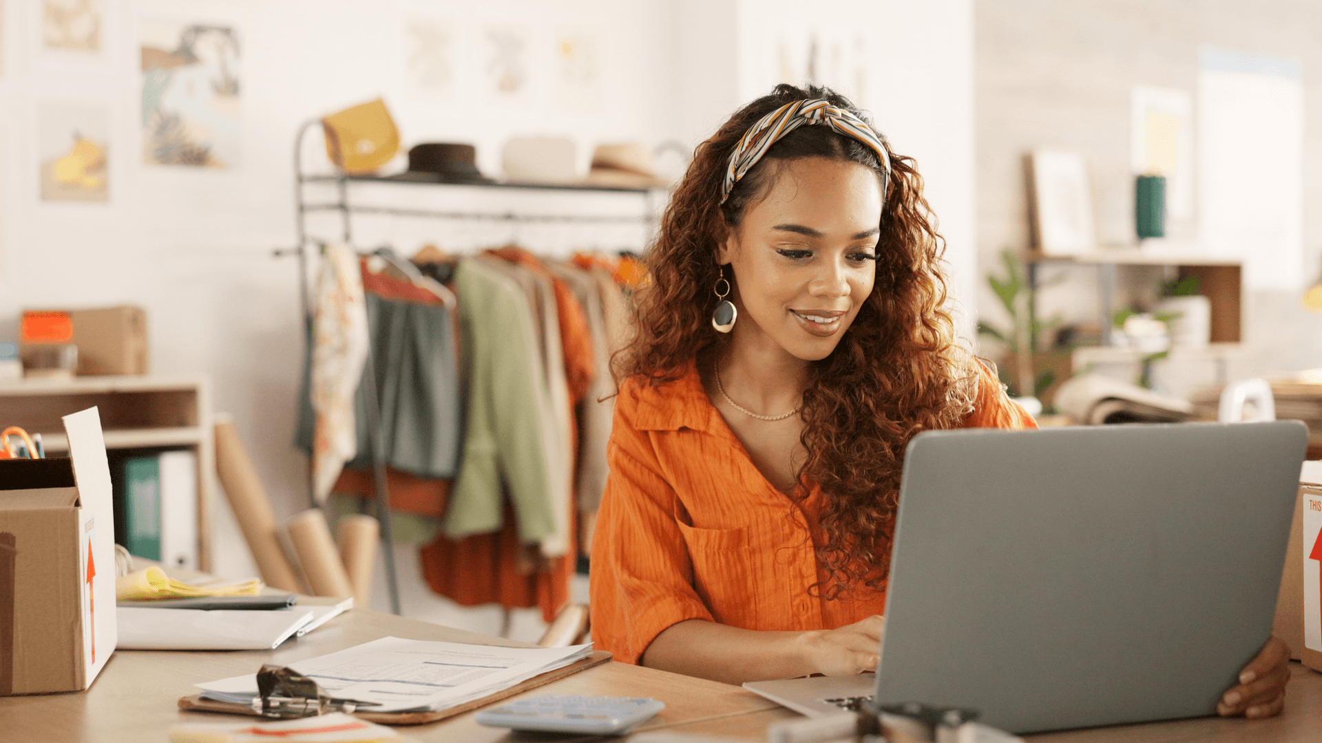 female business owner working on computer