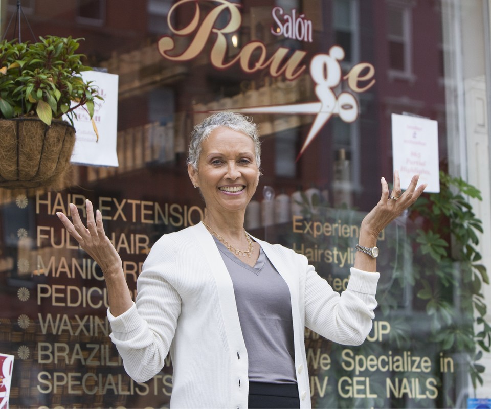 woman business owner celebrating a success