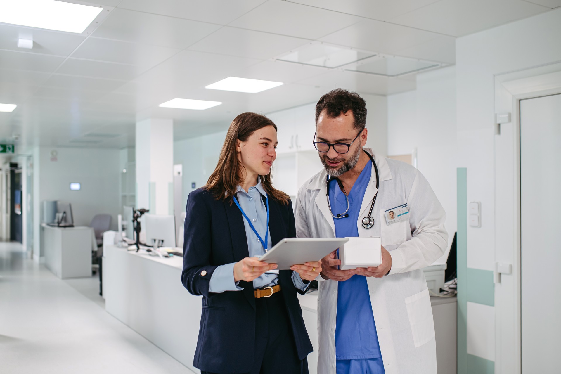 A doctor and a media consultant discuss strategy