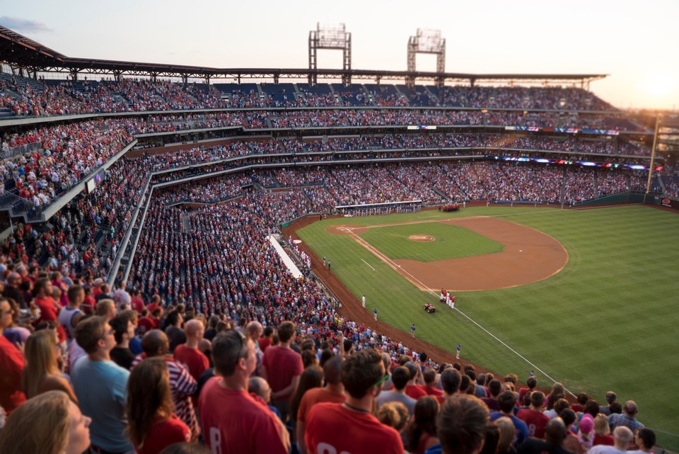 watching a baseball game from high in the stands