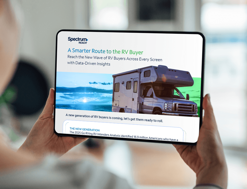 lady holding tablet with the download asset visible