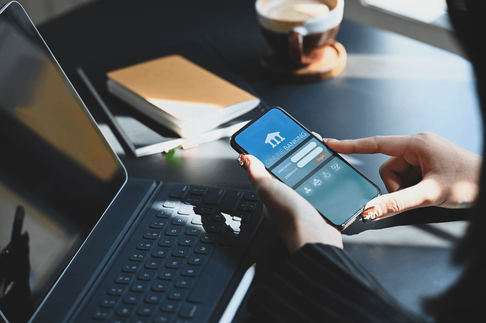 woman banking online with smartphone