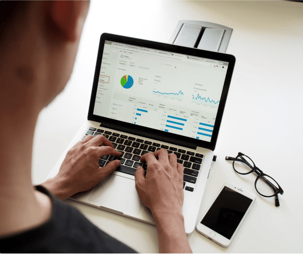 man checking the success of his campaign on laptop